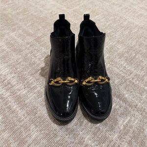 Tory Burch Black Ankle Boots with Gold Accent